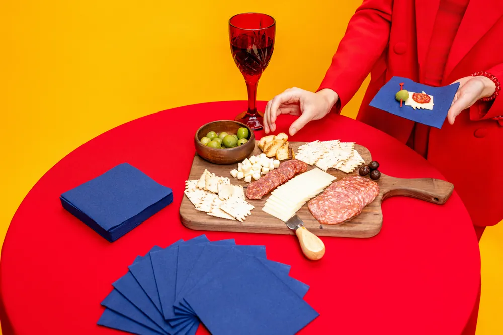 Blue Singular napkins at a colorful tasting table